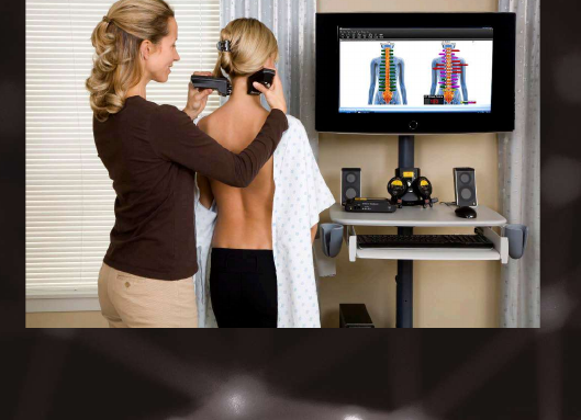 Practitioner performing a ScanVision scan on a patient